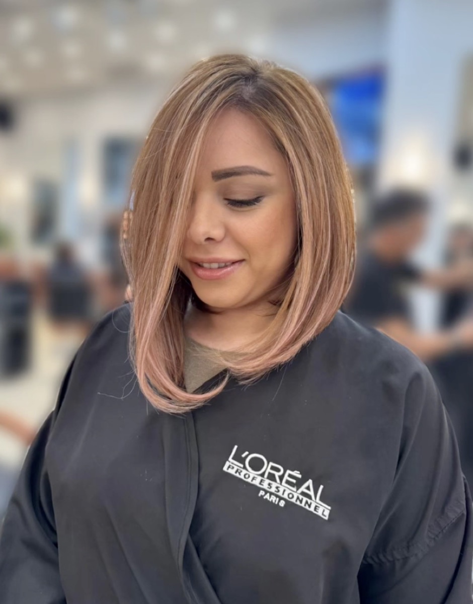 Finished women's cut with soft rose blonde color
